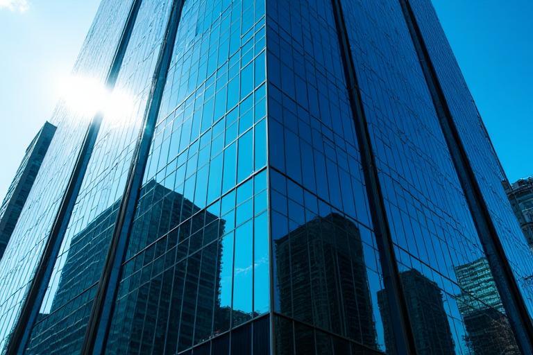 Modern glass facade of Horizon Towers commercial building